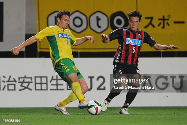 Nejc Pecnik of JEF United Chiba and Kazuki Kushibiki of Consadole Sapporo compete for the ball during the J.League second division match between JEF...