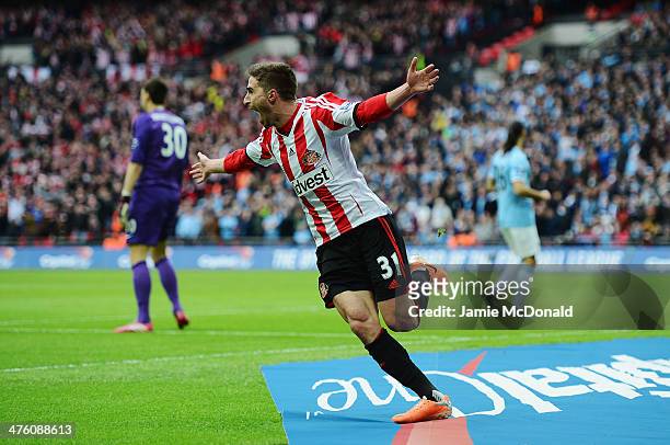 Fabio Borini of Sunderland celebrates scoring the opening goal during the Capital One Cup Final between Manchester City and Sunderland at Wembley...