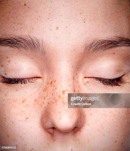 close-up of teenagers face. eyes close - complexion foto e immagini stock