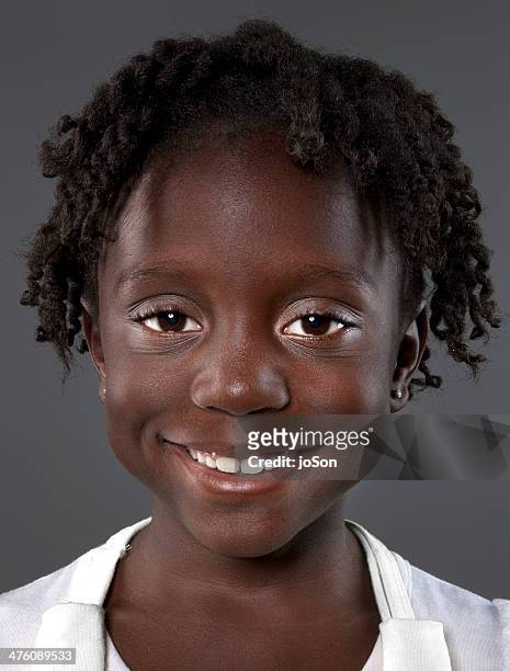 portrait of young african-american girl, smiling - banbossy stock pictures, royalty-free photos & images