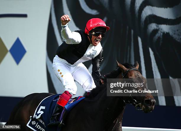 Frankie Dettori celebrates as he rides Golden Horn to win The Investec Derby at Epsom racecourse on June 06, 2015 in Epsom, England.