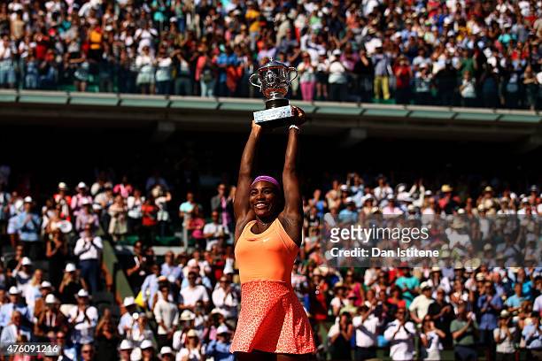 Serena Williams of the United States lifts the Coupe Suzanne Lenglen trophy after winning the Women's Singles Final against Lucie Safarova of Czech...