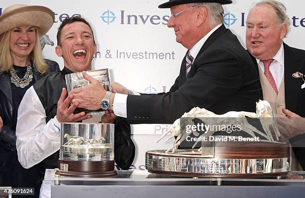 Jockey Frankie Dettori, Global Managing Director of Investec Bernard Kantor and horse owner Anthony Oppenheimer celebrate Golden Horn's win of The...