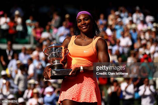 Serena Williams of the United States poses with the Coupe Suzanne Lenglen trophy after winning the Women's Singles Final against Lucie Safarova of...