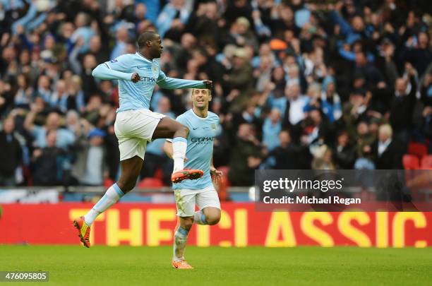 Yaya Toure of Manchester City celebrates his goal with Pablo Zabaleta of Manchester City during the Capital One Cup Final between Manchester City and...