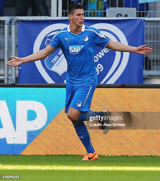 Niklas Suele of Hoffenheim celebrates his team's second goal during the Bundesliga match between 1899 Hoffenheim and VfL Wolfsburg at Wirsol...