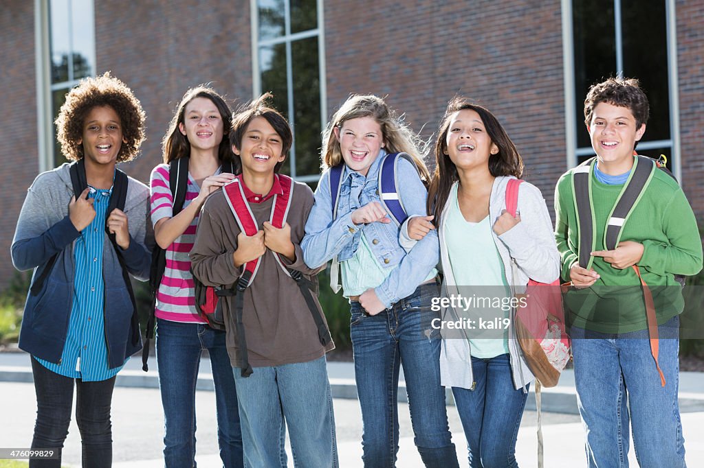 Students standing outside building