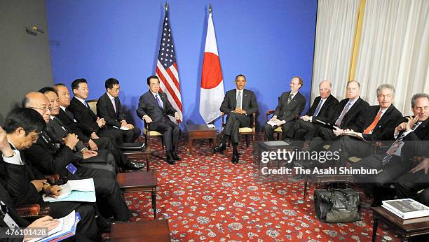 President Barack Obama and Japanese Prime Minister Naoto Kan talk during their bilateral meeting on the sidelines of the G8 summit on May 26, 2011 in...