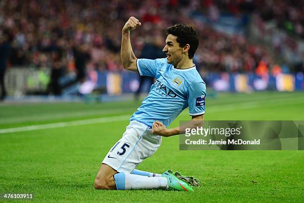 Jesus Navas of Manchester City celebrates after scoring his team's third goal during the Capital One Cup Final between Manchester City and Sunderland...