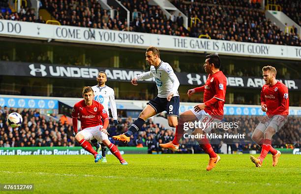 Roberto Soldado of Tottenham Hotspur scores the opening goal during the Barclays Premier League match between Tottenham Hotspur and Cardiff City at...
