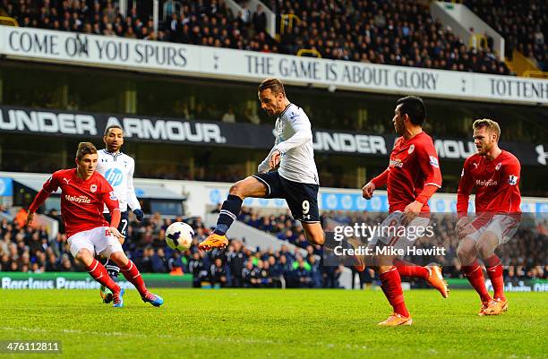 Roberto Soldado of Tottenham Hotspur scores the opening goal during the Barclays Premier League match between Tottenham Hotspur and Cardiff City at...