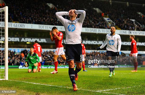 Roberto Soldado of Tottenham Hotspur celebrates scoring the opening goal during the Barclays Premier League match between Tottenham Hotspur and...