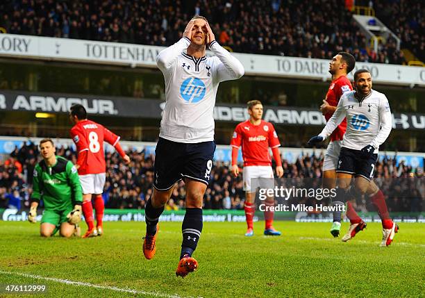 Roberto Soldado of Tottenham Hotspur celebrates scoring the opening goal during the Barclays Premier League match between Tottenham Hotspur and...