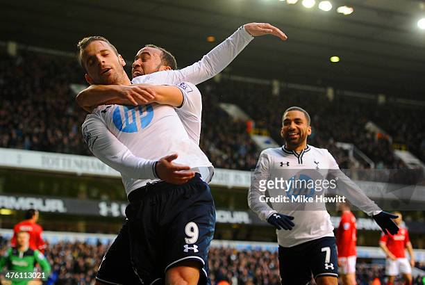 Roberto Soldado of Tottenham Hotspur celebrates scoring the opening goal with Andros Townsend and Aaron Lennon of Tottenham Hotspur during the...