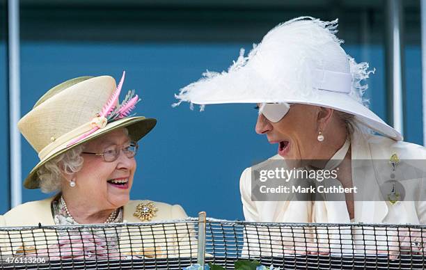 Queen Elizabeth II and Princess Michael of Kent watching the racing on Derby Day at Epsom Racecourse on June 6, 2015 in Epsom, England.