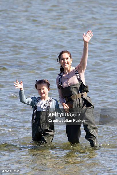 Princess Isabella of Denmark, accompanied by her mother Crown Princess Mary of Denmark visits a nature school, and view fish and shrimps in the...