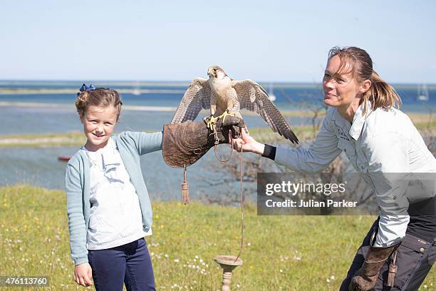 Princess Isabella of Denmark handles a Falcon during a visit to a Nature School,and Falconry Centre during her first day of official engagements...