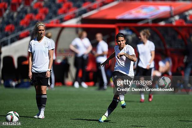 Dzsenifer Maroszan of Germany takes a shot during a training session ahead of their Group B match against Cote d'Ivoire at Lansdowne Stadium on June...