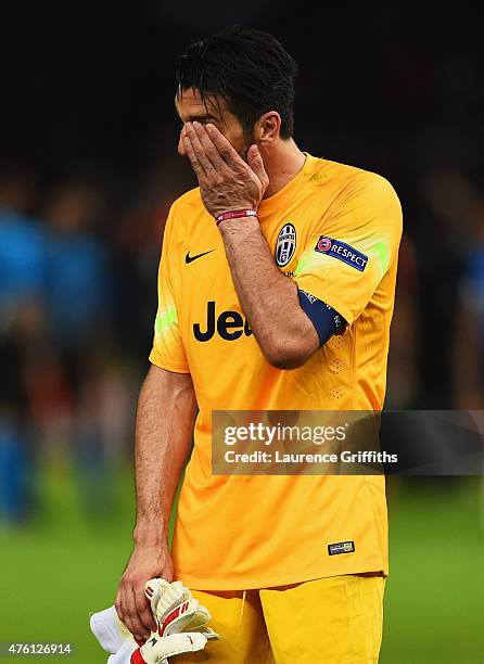 Gianluigi Buffon of Juventus looks dejected after the UEFA Champions League Final between Juventus and FC Barcelona at Olympiastadion on June 6, 2015...