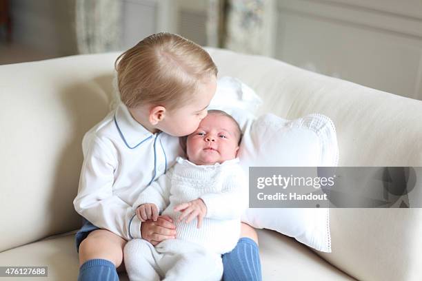 In this undated handout image released by the Duke and Duchess of Cambridge, Prince George and Princess Charlotte at Anmer Hall in mid-May in...