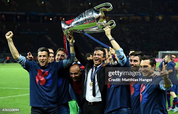 Luis Enrique manager of Barcelona celebrates victory with the trophy after the UEFA Champions League Final between Juventus and FC Barcelona at...