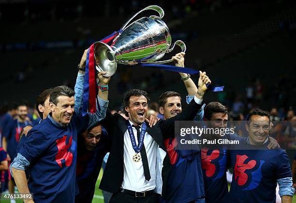 Luis Enrique manager of Barcelona celebrates victory with the trophy after the UEFA Champions League Final between Juventus and FC Barcelona at...