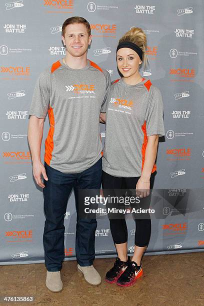 Olympic athletes John Daly and Nastia Liukin attend the 2014 "Cycle For Survival" Benefit Ride for Memorial Sloan Kettering Cancer Center at Equinox...