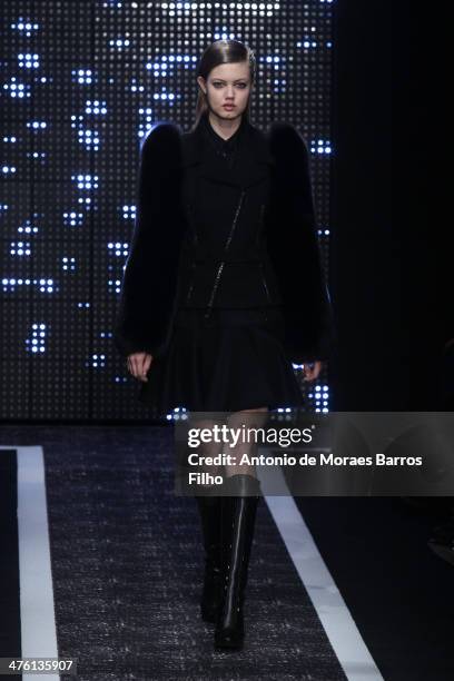 Lindsey Wixsonl walks the runway during the Maxime Simoens show as part of the Paris Fashion Week Womenswear Fall/Winter 2014-2015 on March 2, 2014...