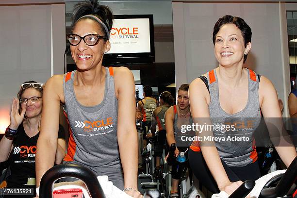 Carla Hall and Ellie Krieger attend the 2014 "Cycle For Survival" Benefit Ride for Memorial Sloan Kettering Cancer Center at Equinox Rock Center on...