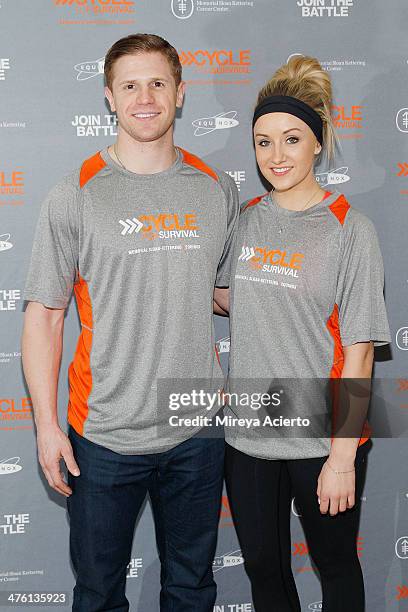 Olympic athletes John Daly and Nastia Liukin attend the 2014 "Cycle For Survival" Benefit Ride for Memorial Sloan Kettering Cancer Center at Equinox...