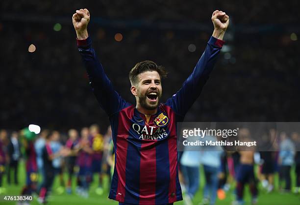 Gerard Pique of Barcelona celebrates after the UEFA Champions League Final between Juventus and FC Barcelona at Olympiastadion on June 6, 2015 in...