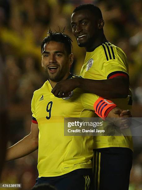 Radamel Falcao Garcia, of Colombia, celebrates with teammate Jackson Martinez after scoring during a friendly match between Colombia and Costa Rica...