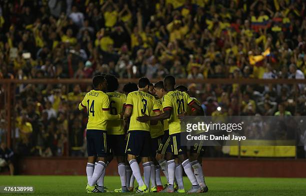 Radamel Falcao Garcia, of Colombia, celebrates with teammates after scoring during a friendly match between Colombia and Costa Rica at Diego Armando...