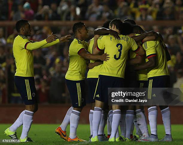 Radamel Falcao Garcia, of Colombia, celebrates with teammates after scoring during a friendly match between Colombia and Costa Rica at Diego Armando...