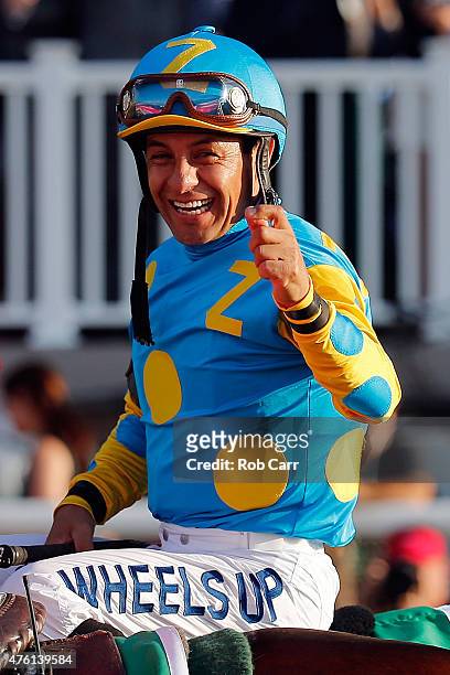 Victor Espinoza, celebrates atop American Pharoah, in the winner's circle after winning the 147th running of the Belmont Stakes at Belmont Park on...