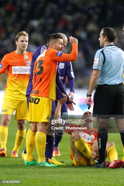 Benji De Ceulaer of KRC Genk and referee Alexandre Boucaut during the Jupiler League match between RSC Anderlecht and Krc Genk on March 02, 2014 in...