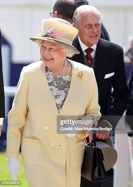 Queen Elizabeth II and Prince Philip, Duke of Edinburgh attend Derby Day during the Investec Derby Festival at Epsom Racecourse on June 6, 2015 in...