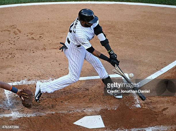 Alexei Ramirez of the Chicago White Sox hits a broken bat single in the 1st inning against the Detroit Tigers at U.S. Cellular Field on June 5, 2015...