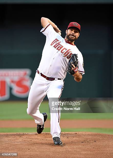 Josh Collmenter of the Arizona Diamondbacks throws a few warm up pitches prior to a game against the Atlanta Braves at Chase Field on June 2, 2015 in...