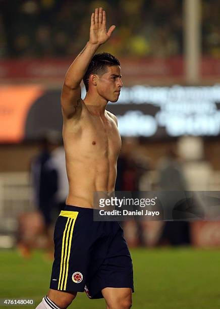 James Rodriguez of Colombia greets fans at the end of a friendly match between Colombia and Costa Rica at Diego Armando Maradona Stadium on June 06,...