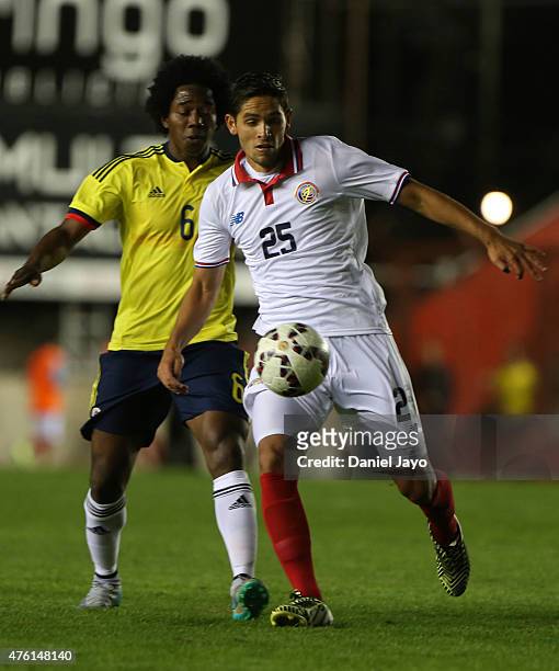 Carlos Sanchez, of Colombia, and Jonathan Moya, of Costa Rica battle for the ball during a friendly match between Colombia and Costa Rica at Diego...