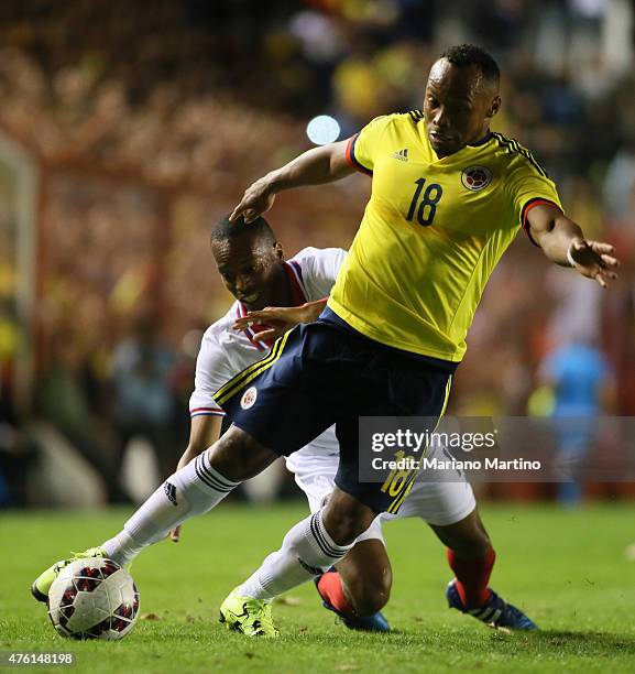 Camilo Zuñiga of Colombia and Junior Diaz of Costa Rica fight for the ball during a friendly match between Colombia and Costa Rica at Diego Armando...