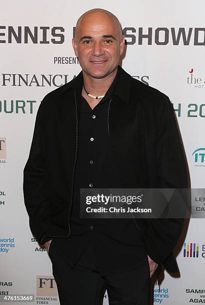 Andre Agassi poses for a photograph in the Garden Room at the Athenaeum Hotel at the World Tennis Day Showdown London VIP Party on March 2, 2014 in...