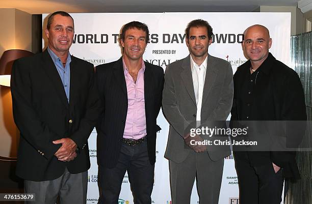 Ivan Lendl, Pat Cash, Pete Sampras and Andre Agassi pose for a photograph in the Garden Room at the Athenaeum Hotel at the World Tennis Day Showdown...