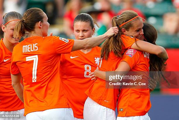 Lieke Martens of Netherlands hugs Danielle Van De Donk as she celebrates her goal against New Zealand with her teammates during the FIFA Women's...