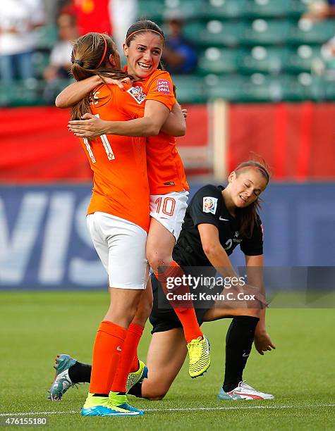 Lieke Martens of Netherlands hugs Danielle Van De Donk as she celebrates her goal against New Zealand during the FIFA Women's World Cup Canada 2015...