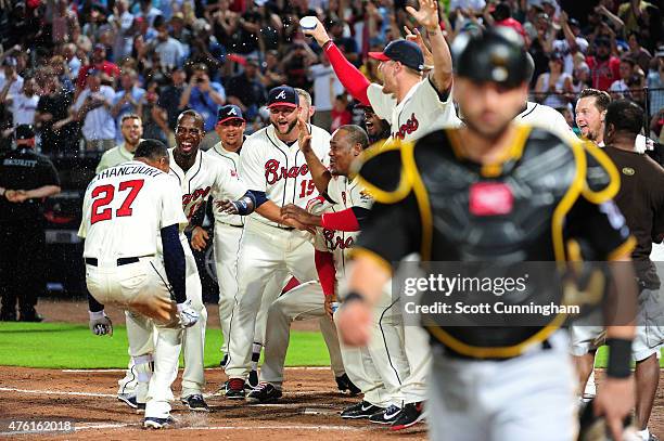 Christian Bethancourt of the Atlanta Braves arrives at home plate after hitting a walk-off ninth inning solo home run against the Pittsburgh Pirates...