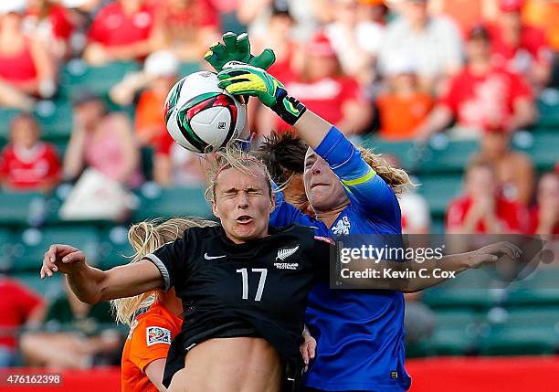 Goalkeeper Loes Geurts of Netherlands defends a corner kick against Hannah Wilkinson and Sarah Gregorius of New Zealand during the FIFA Women's World...