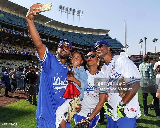 Jaleel White, Samaya White, Vivica A. Fox and Shemar Moore take a selfie at the Dodgers' Hollywood Stars Night Game at Dodger Stadium on June 6, 2015...