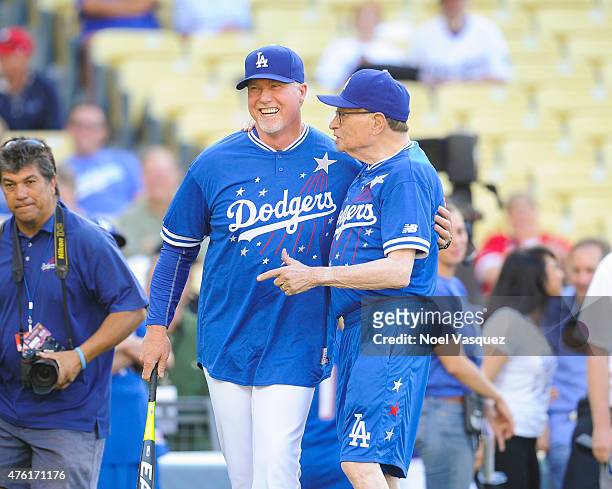 Larry King brings Mark McGwire pitch hitter at the Dodgers' Hollywood Stars Night Game at Dodger Stadium on June 6, 2015 in Los Angeles, California.